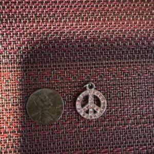 pink crystal pendant peace sign